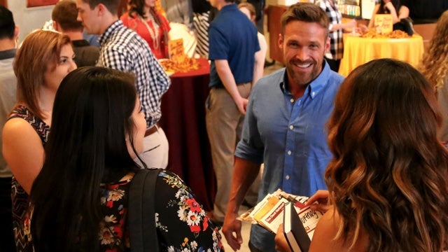 People conversing at a banquet