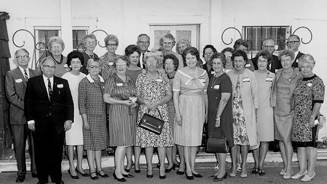 Group of people posing for photograph